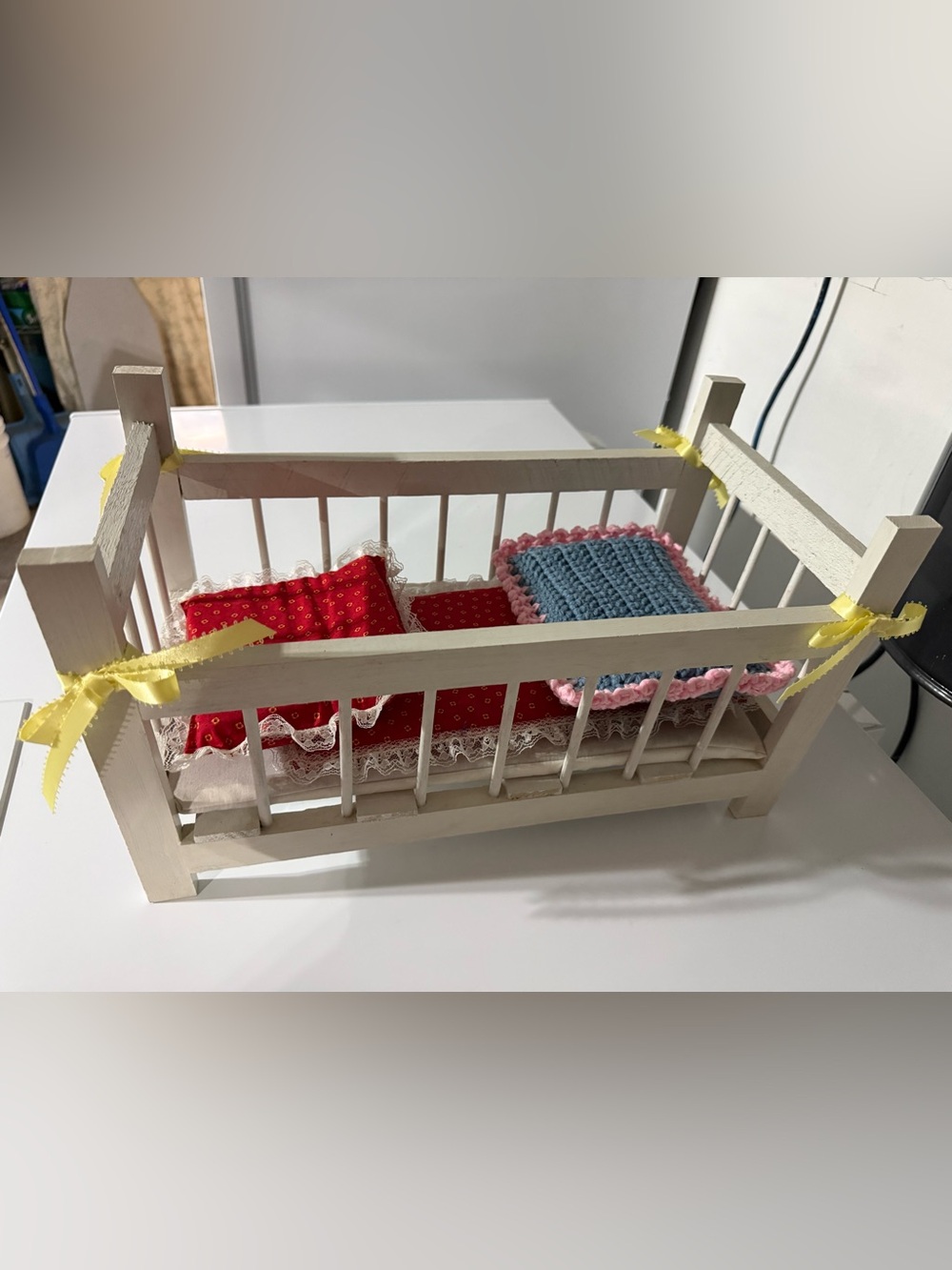 vintage white wooden doll crib